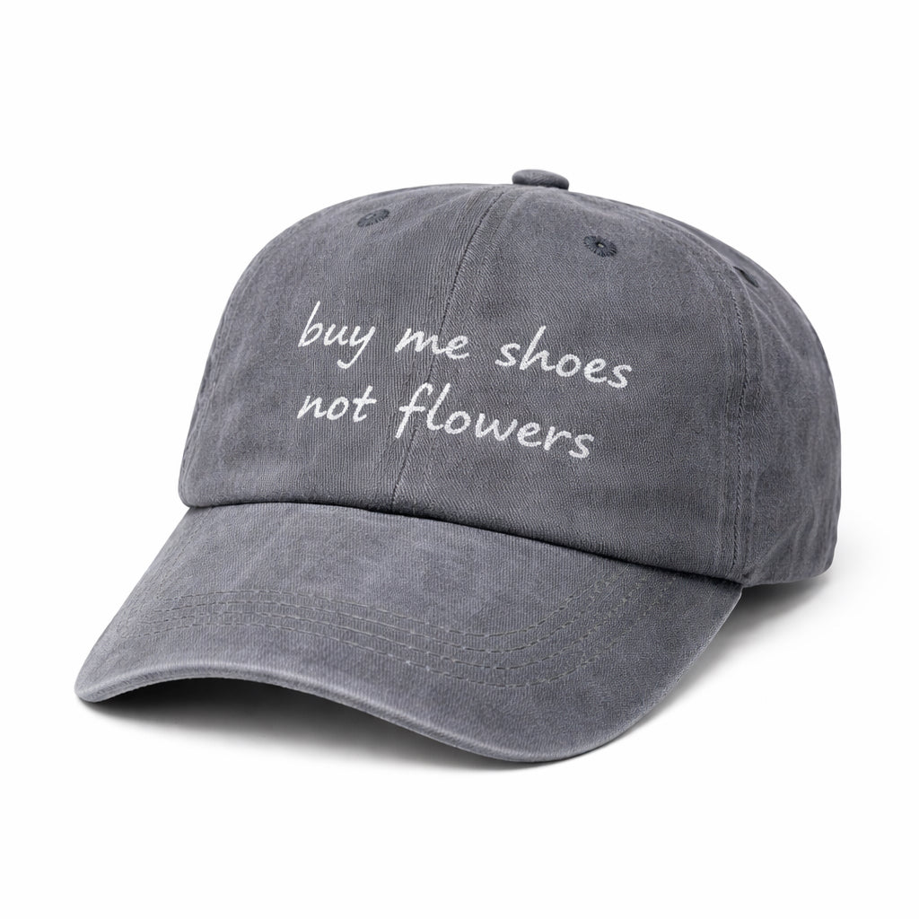 Gorra “BUY ME SHOES NOT FLOWERS”