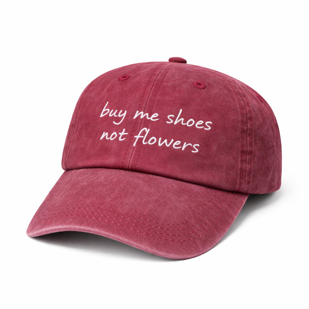 Gorra “BUY ME SHOES NOT FLOWERS”